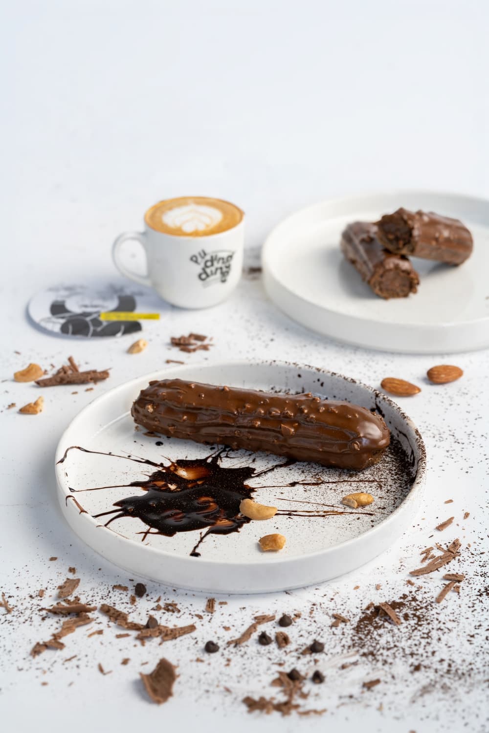 Fudge & Nut Frenzy Eclair (Chocolate Eclair)